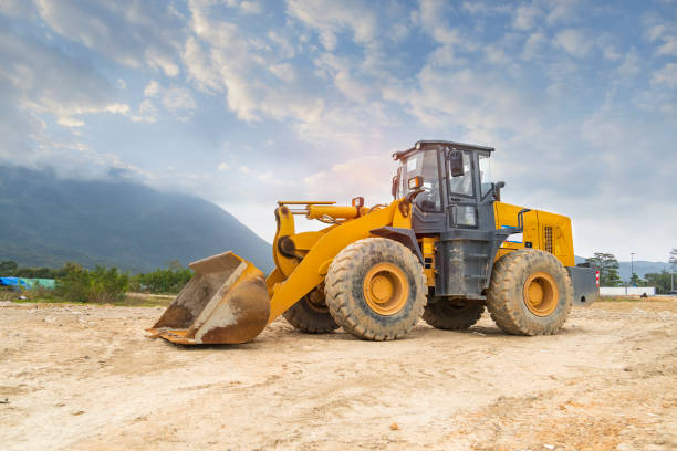 excavator loader machine during earthmoving works outdoors